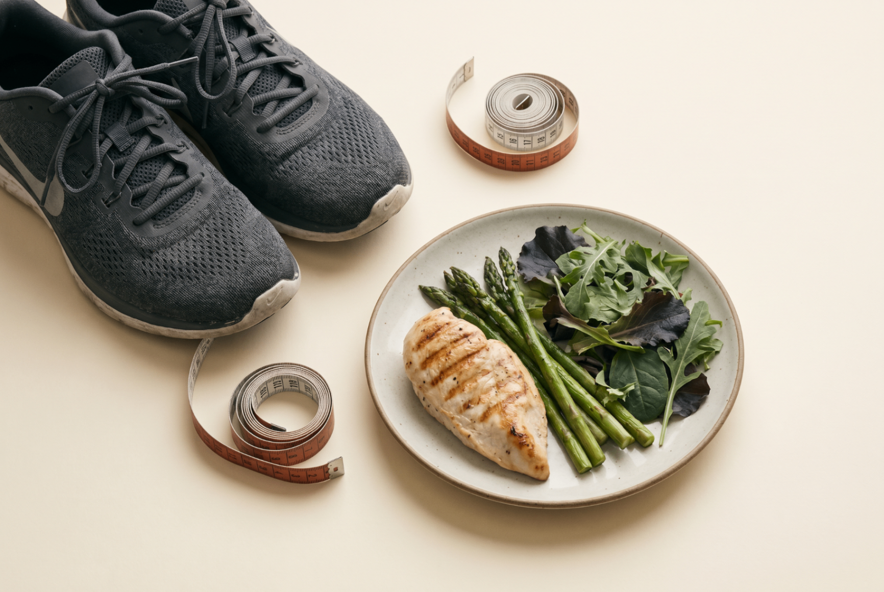 Running shoes, measuring tape, and a lean meal